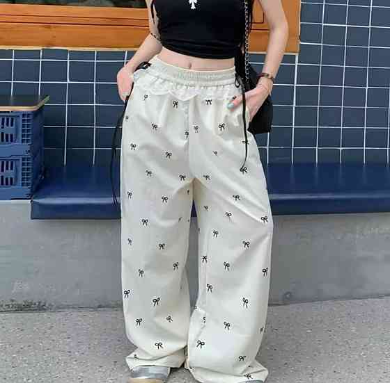 Женские стильные оверсайз брюки карго с бантиками отделаны кружевом плащевка Одесса