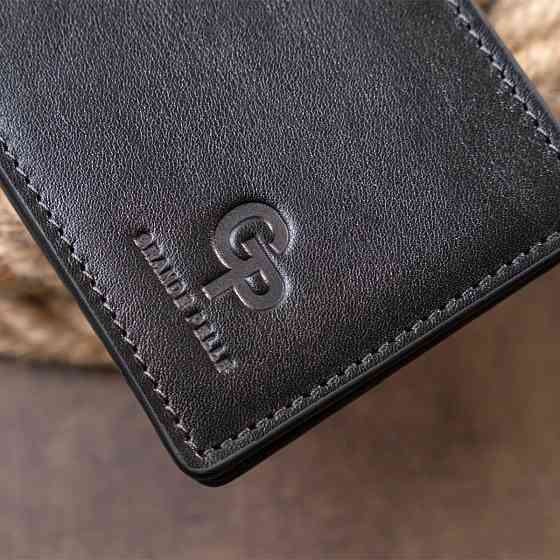 Стильне портмоне з затискачем для грошей без застібки в гладкій шкірі GRANDE PELLE 11297 Чорне Київ