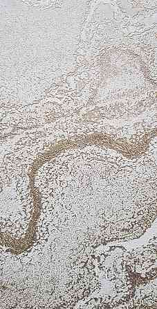 Шпалери вінілові на флізеліні AS creation Della Natura 1.06Х10 абстракція хвилі структурні золотисті на білому Київ