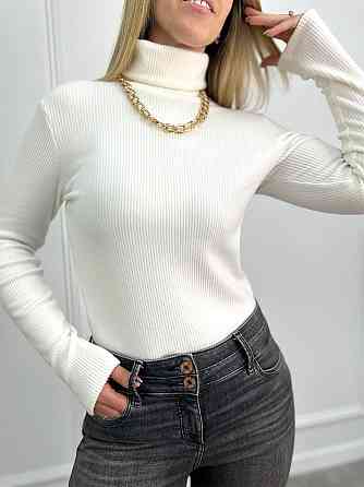 Женский теплый гольф в рубчик 