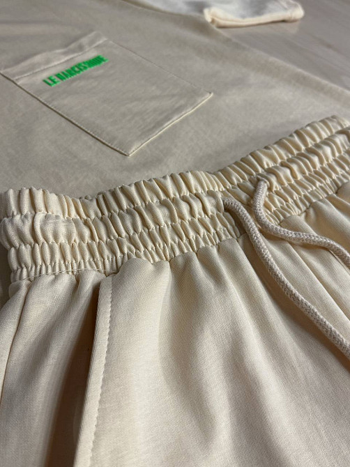 Костюм женский CAPPITONE 20101 оверсайз футболка и брюки-джогеры с надписью бежевый, бежевый, L Киев - изображение 5