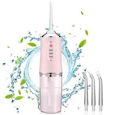 Ирригатор для чистки зубов и полости рта Oral Irrigator с аккумулятором и сменными насадками. Цвет: розовый UZ-30 Львов