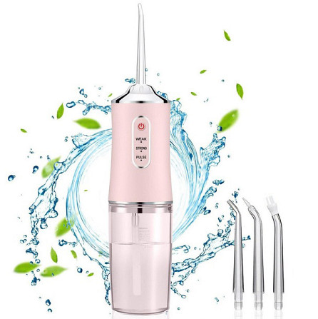 Ирригатор для чистки зубов и полости рта Oral Irrigator с аккумулятором и сменными насадками. Цвет: розовый UZ-30 Львов - изображение 5