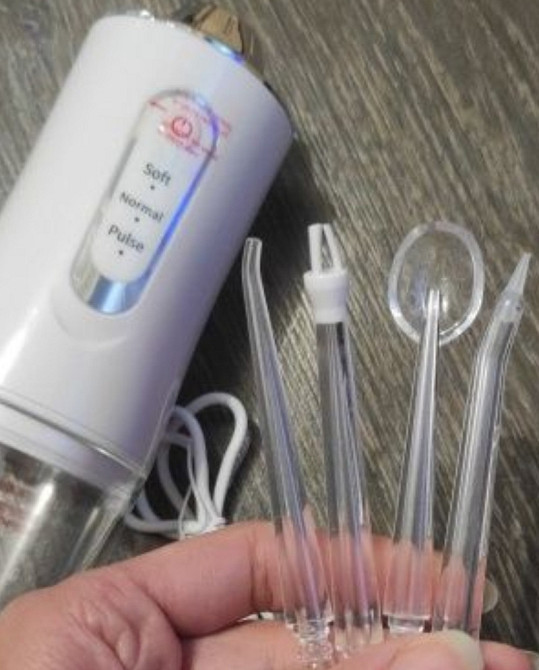Портативный электрический ирригатор для полости рта, Oral irrigator. Киев - изображение 1