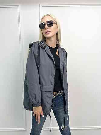 Жіноча вітровка на підкладці з капюшоном "Tysson" оптом | Норма і батал | Розпродаж моделі Київ