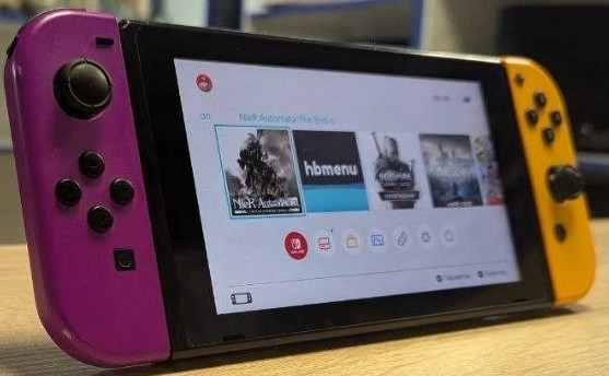Приставка Nintendo Switch Neon Purple - Orange. Киев - изображение 3