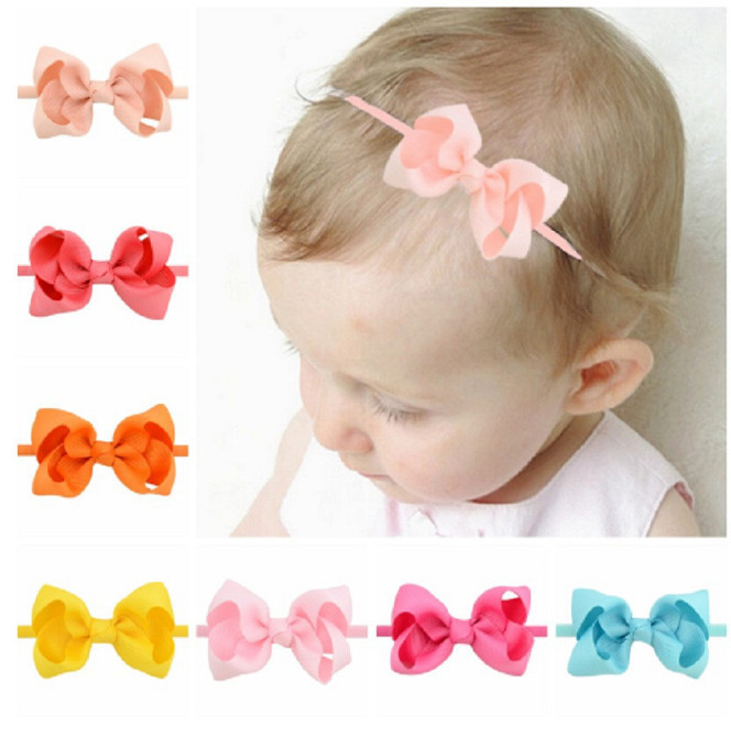 Детская повязочка на голову коралловая - размер универсальный (на резинке), бантик 8см Киев - изображение 3