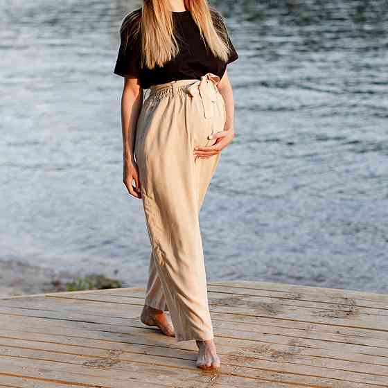 Широкі штани для вагітних з легкої тканини Бежеві Київ