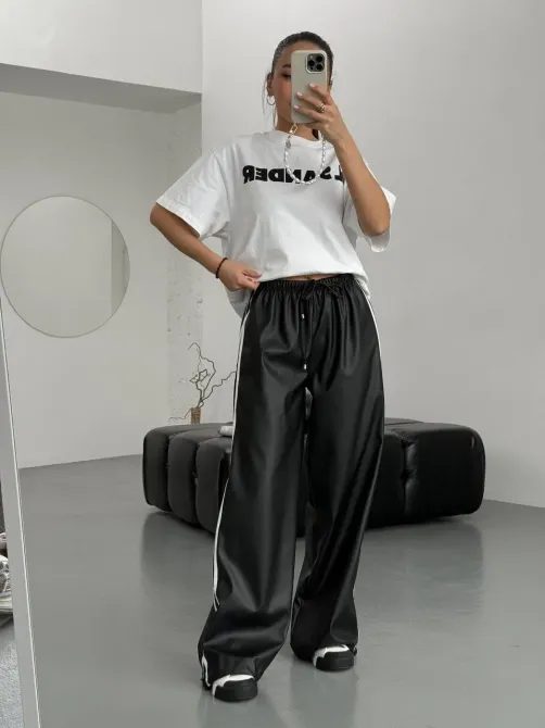 Жіночі теплі шкіряні штани з лампасами на флісі знизу з затяжками Харків - фото 2