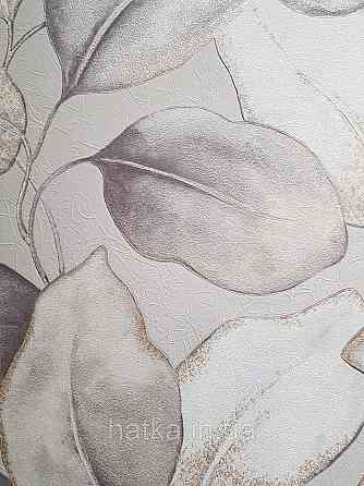 Обои виниловые на флизелиновой основе Rasch Incanto 1.06х10 листья крупные белые светло серые золотистые Киев