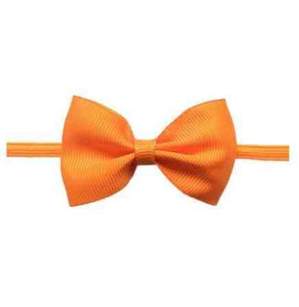 Дитяча повязочка на голову помаранчева - розмір універсальний (на резинці), бантик 7см Київ