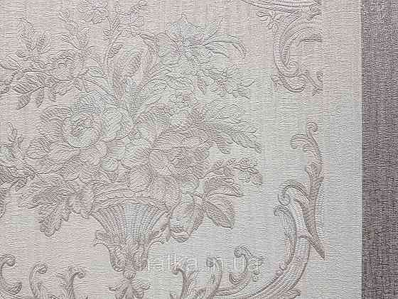 Шпалери вінілові на флізеліні AdaWall Seyyah 1.06х10 квіти в горщику вензеля структурні сріблясті на білому Київ