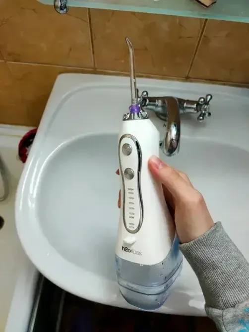 Іригатор порожнини рота портативний H2oFlos HF-6 чорний, 8 насадок + дорожня сумка в подарунок Київ - фото 9