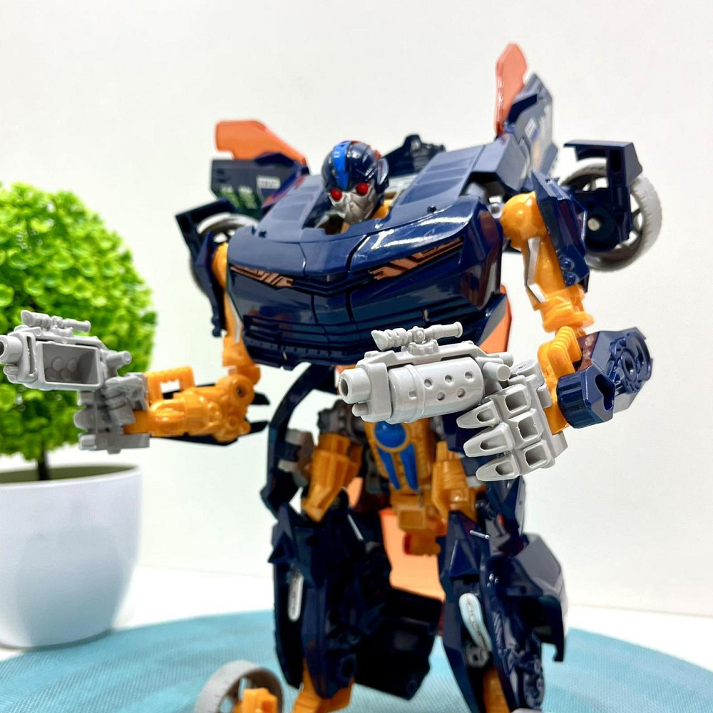 Робот-трансформер машинка 24см з аксесуарами Оранжево-чорний (JJ707A-B-C) Чернігів - фото 3