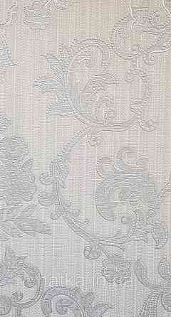 Обои виниловые на флизелине AdaWall Seyyah 1.06х10 вензеля завитки крупные структурные серебристые на белом Киев