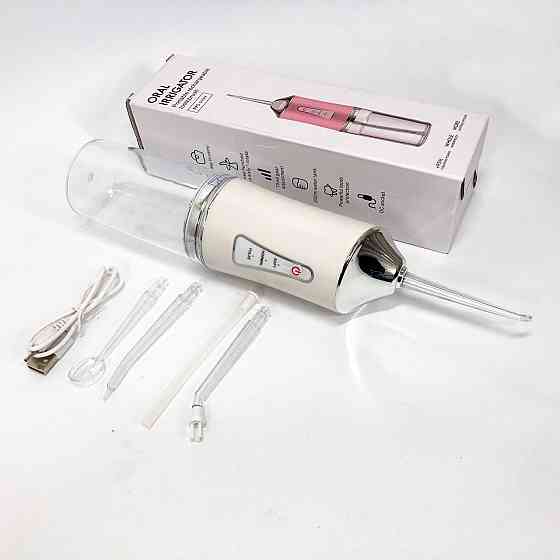 Ирригатор для чистки зубов и полости рта Oral Irrigator с аккумулятором и сменными насадками. Цвет: белый KA-31 Львов
