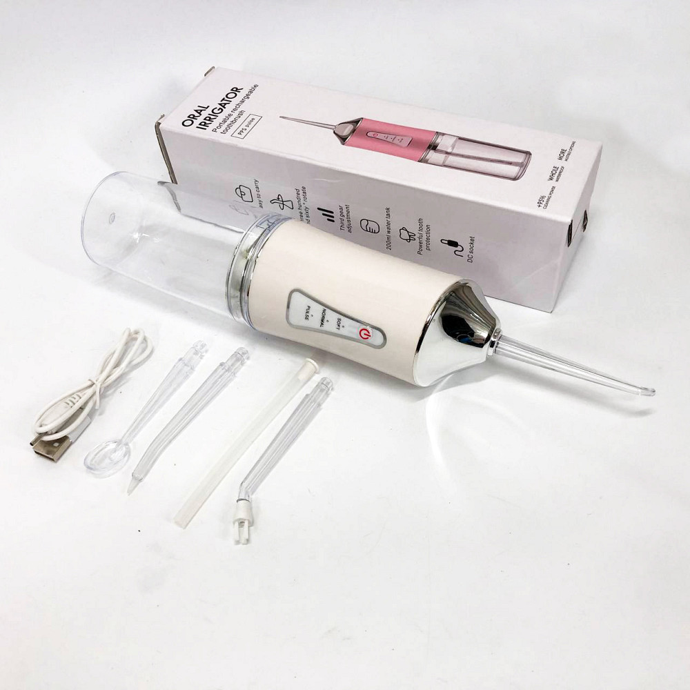 Ирригатор для чистки зубов и полости рта Oral Irrigator с аккумулятором и сменными насадками. Цвет: белый HK-42 Львов - изображение 3