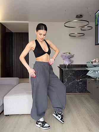 Женские теплые объемные брюки 