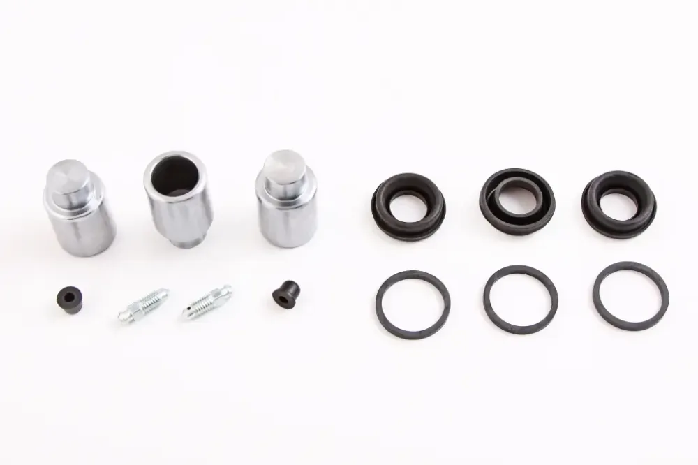 Р/к суппорта 2121 OEM (3 манжети, 3 пилника, 3 поршня, 2 штуцера, 2 ковпачки) Вінниця - фото 1