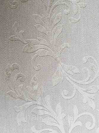 Шпалери вінілові на флізелін метрові Marburg Kingdom 31517 завитки сріблом на світло-сірому тлі Київ