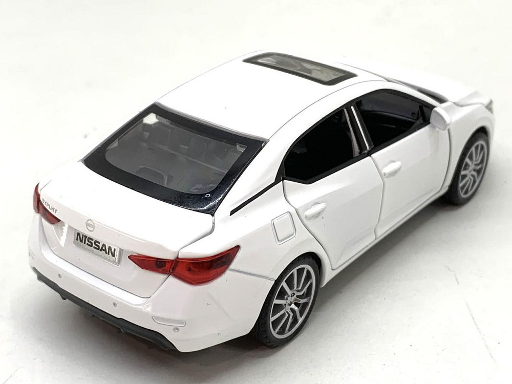 Машина Автосвіт Nissan selfie інерційна масштаб 1:32 відчиняються двері капот багажник 15 см Біла (AP-2084) Чернігів - фото 5
