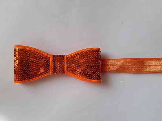 Пов'язка дитяча помаранчева з паєтками - бант близько 10см, окружність 36-48см Київ