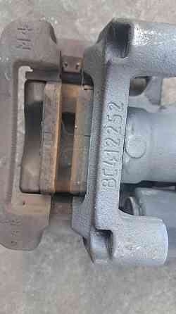 Задний левый суппорт с электронным ручником на Hyundai Tucson 2016–2021 Киев