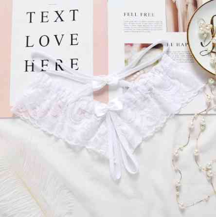 Еротичні трусики білі жіночі з розрізом і бантиками - розмір універсальний (на резинці) Київ