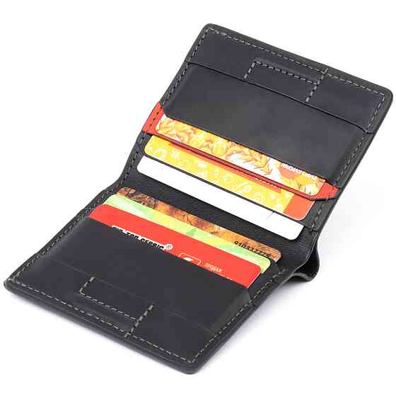 Функціональне тонке портмоне GRANDE PELLE 11326 Чорне Київ