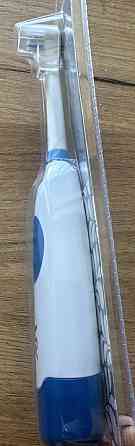 Электрическая зубная щетка. Харьков