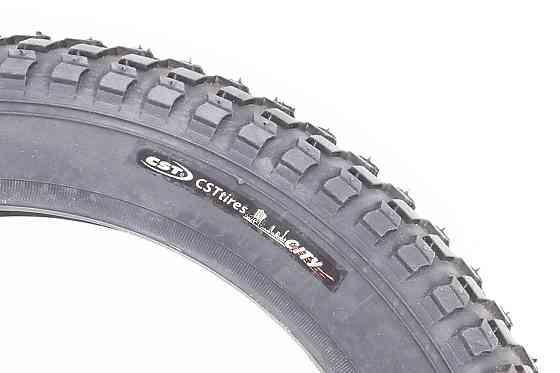 Шина 14"x2,125 (57-254) шипована C712 Київ