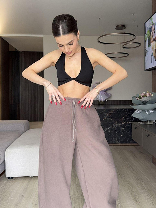 Женские теплые объемные брюки 