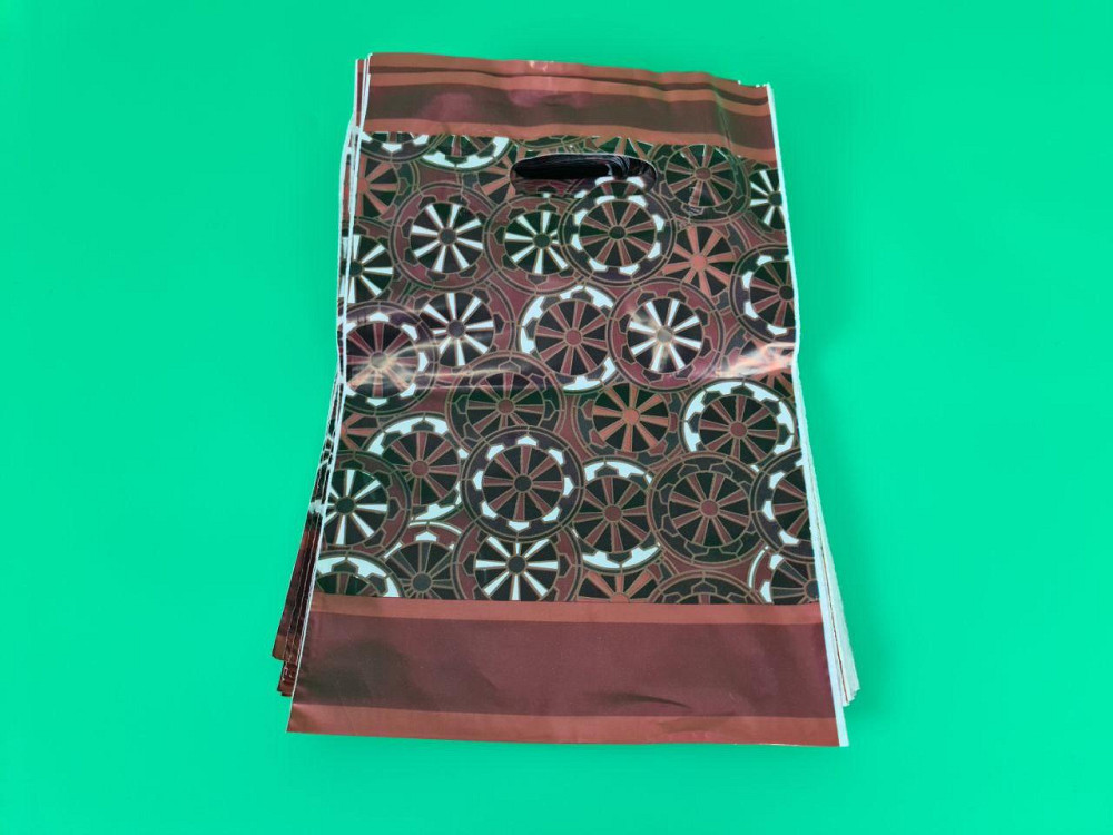 Пакеты с вырубной ручкой(25*35)