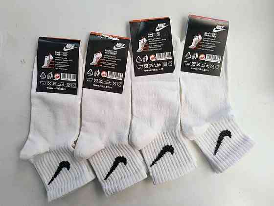 Дитячі якісні бавовняні шкарпетки Білого кольору середньої висоти в наборі 4 штук Nike. Розмір 30-35 Київ