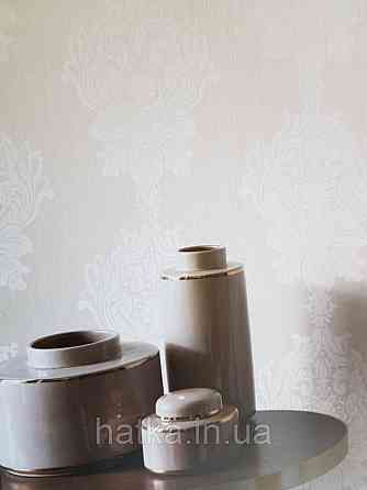 Текстильні шпалери на флізеліновій основі Cador Rasch Textil 086774 вензелі бежевий молочний Київ