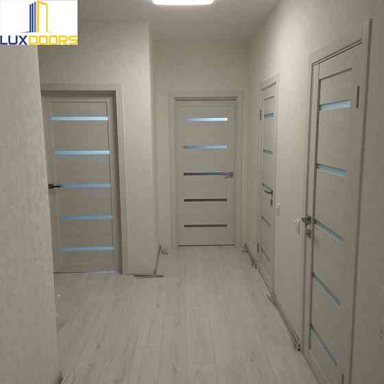 Двери FLORA Лиственница белая Полотно, покрытие eco-tex Киев