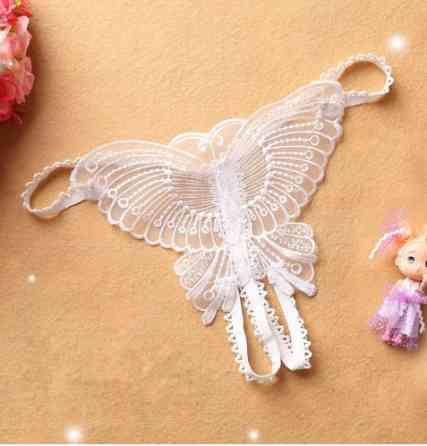 Трусики з розрізом та метеликом білого кольору - розмір універсальний, (на резинці, тянуться) Київ