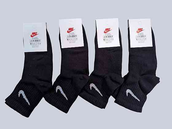 Дитячі якісні бавовняні шкарпетки Чорного кольору середньої висоти в наборі 4 штук Nike. Розмір 31-34 Київ