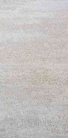 Шпалери вінілові на флізеліновій основі Rasch Ascona 1.06х10 метрові абстракція хвилі смуги коричневі срібло Київ