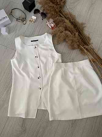Женский базовый костюм двойка: удлиненный жилет и мини юбка из плотной костюмки Молочный, 46/48 Одесса