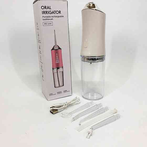 Ирригатор для чистки зубов и полости рта Oral Irrigator с аккумулятором и сменными насадками. Цвет: белый KA-31 Львов
