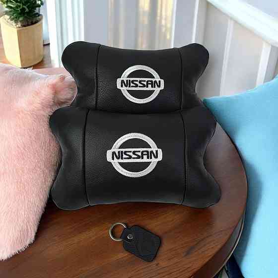 Подушки в авто 2 шт Nissan, натуральна шкіра, з логотипом Ніссан, на підголівник для CN-397 вашої машини Київ