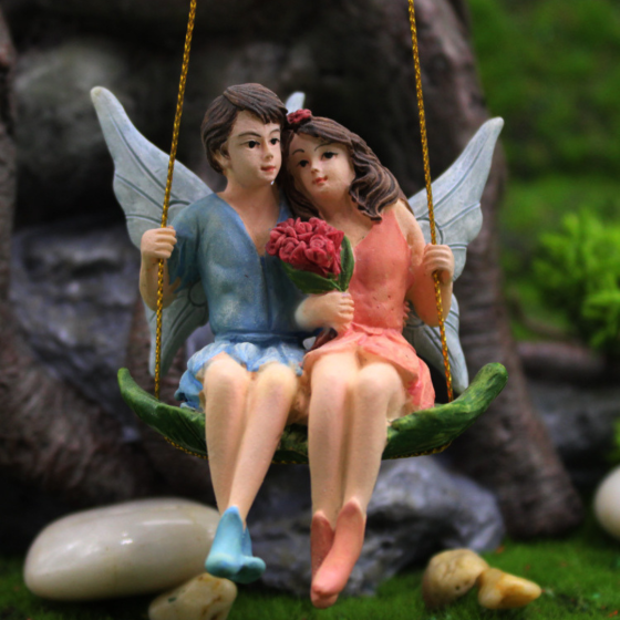 Садовые фигуры Эльфы на качелях. Садовая подвеска качели Одесса