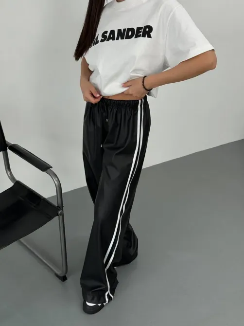 Жіночі теплі шкіряні штани з лампасами на флісі знизу з затяжками Харків - фото 8