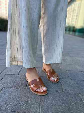 Dino Vittorio Зручні жіночі шкіряні коричневі шльопанці на низькій підошві Dino Vittorio 102-50 Коломыя