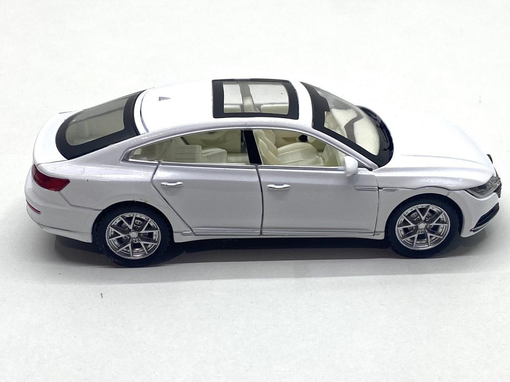 Машинка металева Volkswagen Passat SS 1:32 світло звук Біла (GT-01200) Чернігів - фото 2