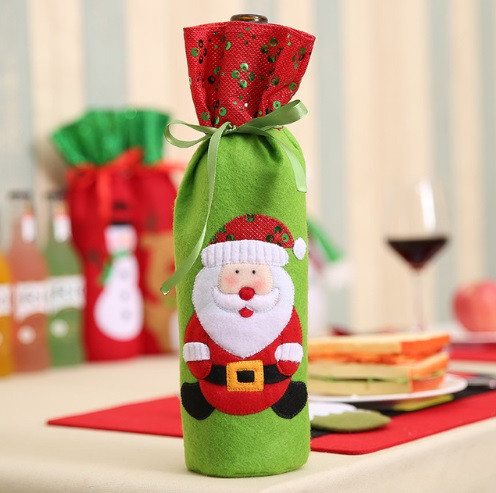 Чехол на бутылку новогодний с пайетками Дед Мороз 32 на 13 см разноцветный Киев - изображение 1