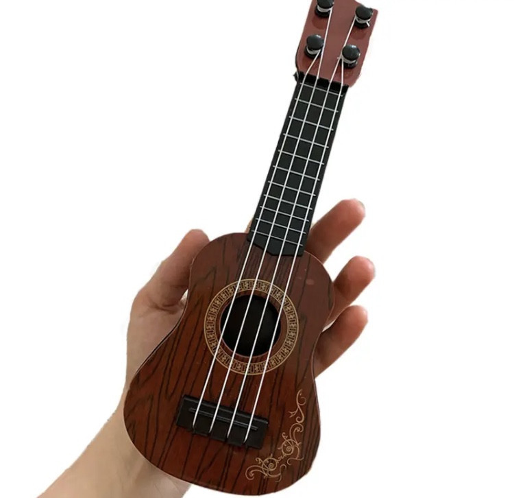 Гітара дитяча іграшка, темно-коричнева, дитяча укулеле, довжина - 25см, ширина 9см, пластик, 4 струни, унісекс, 3+ Київ - фото 2