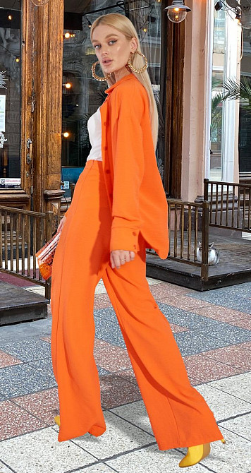 Жовтогарячий брючний костюм Київ - фото 4