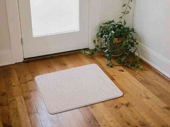 Універсальний низькопрофільний килимок для ванної та коридору Aquarius з антиковзкою гумовою основою 50х70 см Бежевий Буча